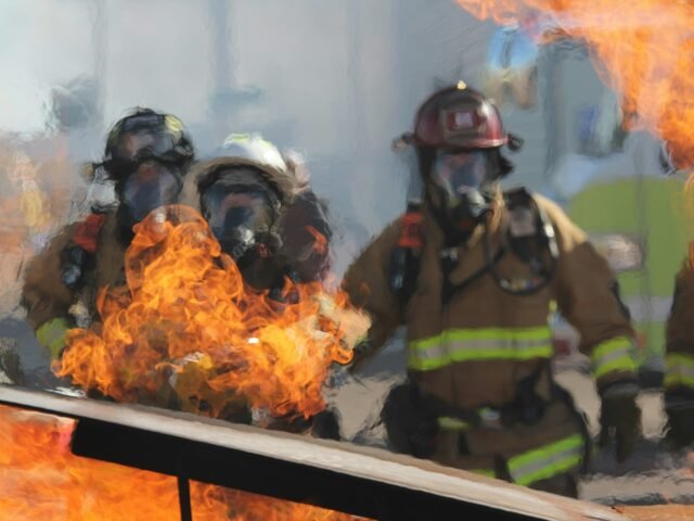 firefighters near fire scaled